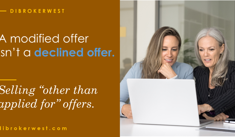 Insurance agent reviewing a modified disability insurance offer letter with a client.